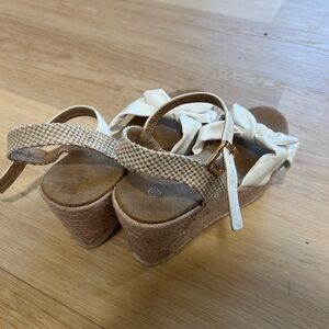 White sandals with heels